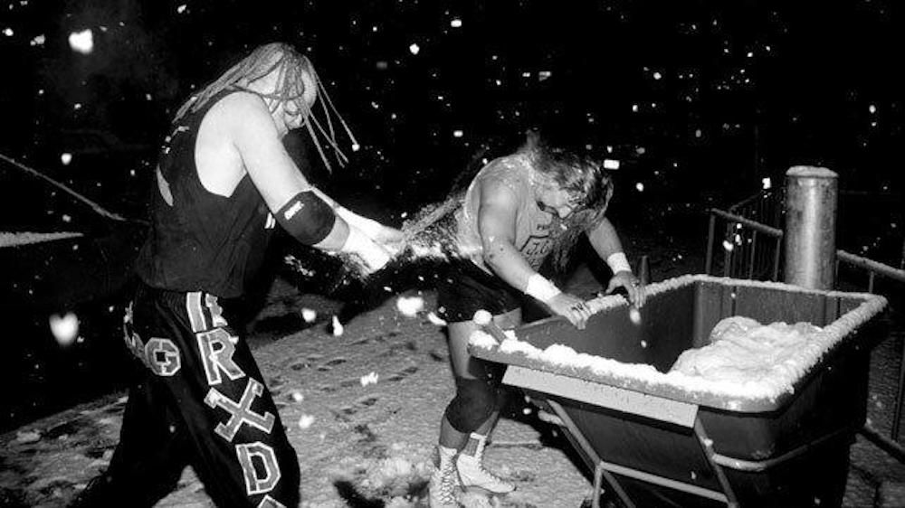 Road Dogg and Al Snow fight for the Hardcore Title in a blizzard