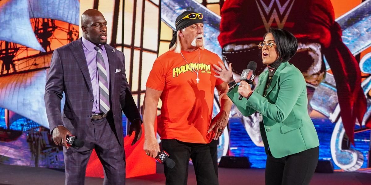 Bayley at WrestleMania 37 with Titus O'Neil and Hulk Hogan