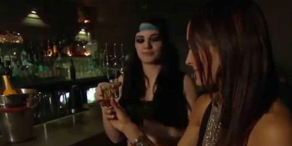 Brie Bella and Paige drinking