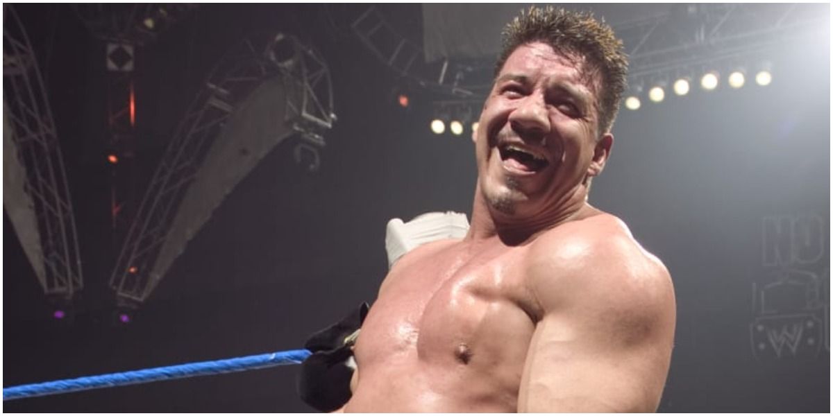 Eddie Guerrero laughing as he enters the ring 