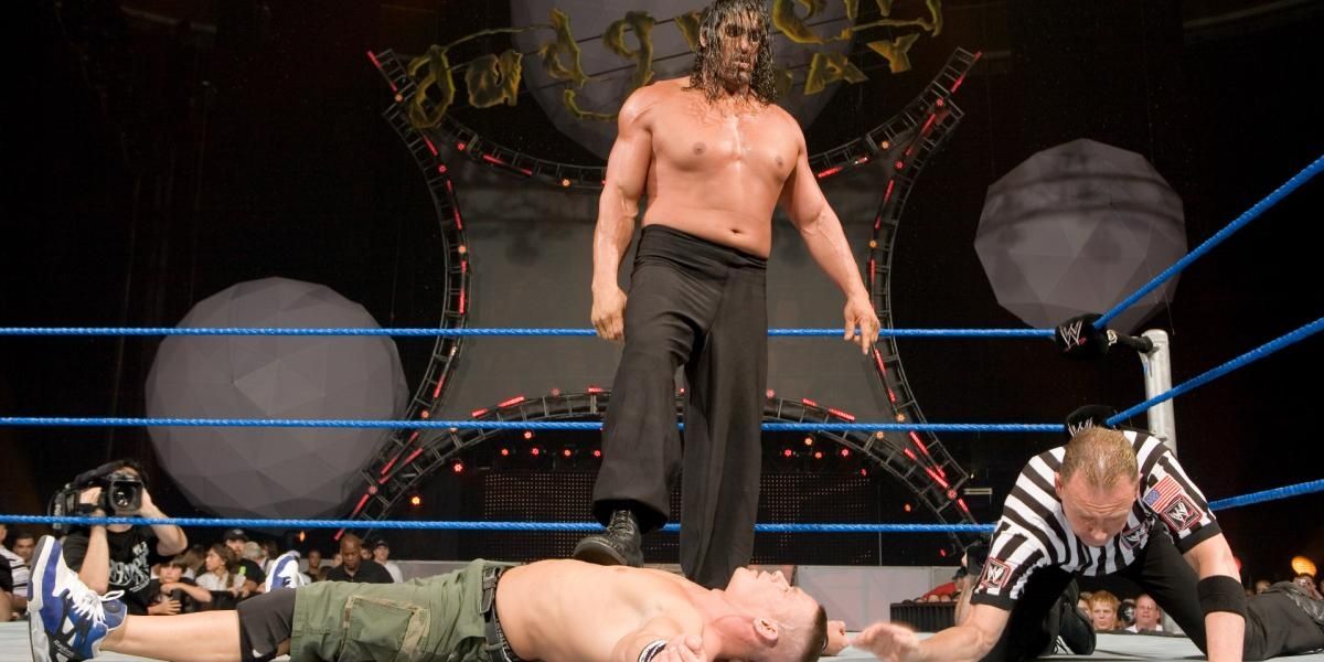 Great Khali stands over John Cena at Judgment Day 2007