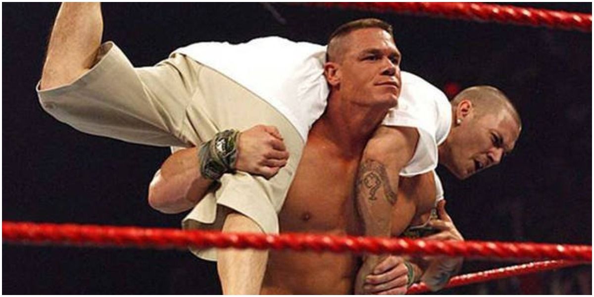 John Cena with Kevin Federline on his back