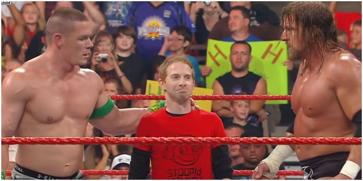 Seth Green with John Cena and Triple H
