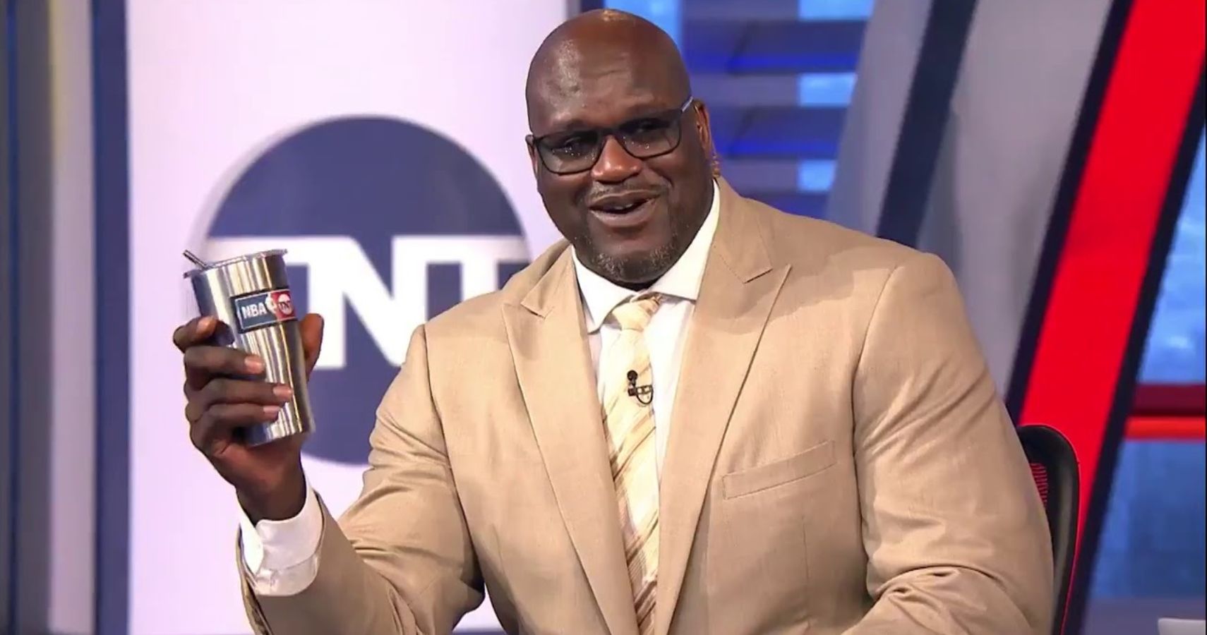 shaq holding things