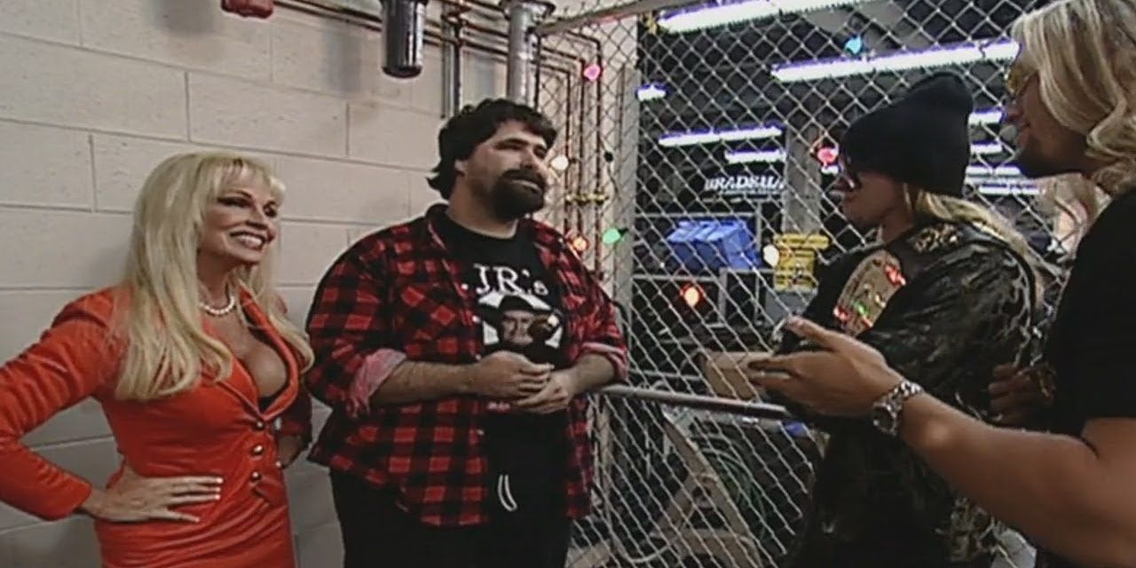 Edge and Christian confront Mick Foley