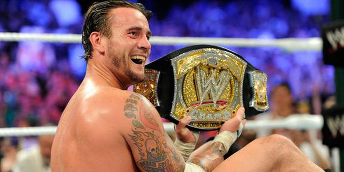 CM Punk with the WWE Title at Money in the Bank 2011