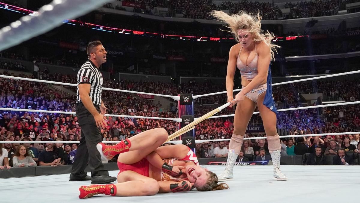Charlotte Flair Breaks A Kendo Stick On Ronda Rousey