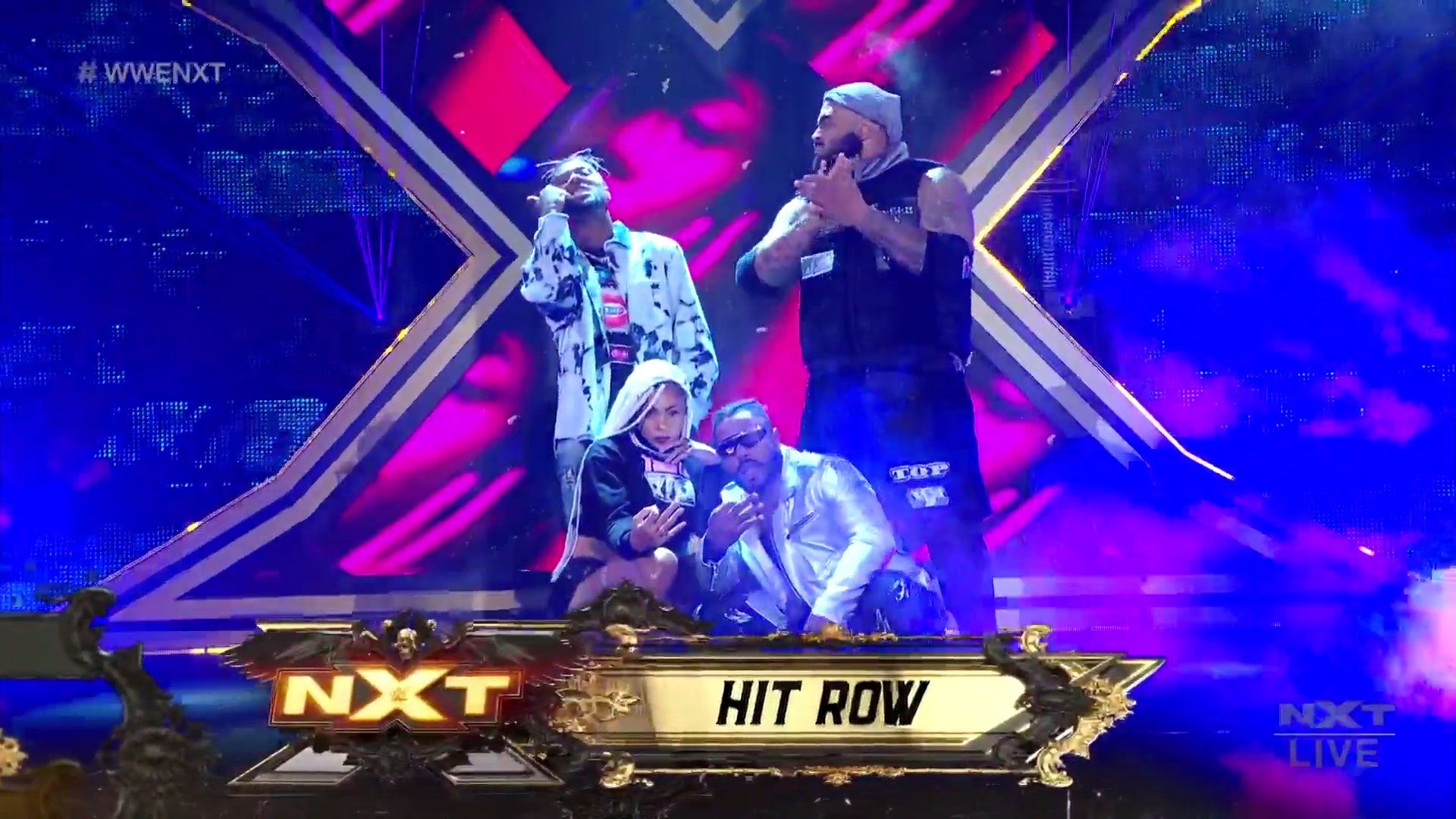 the four member of Hit Row make their way to the ring on NXT