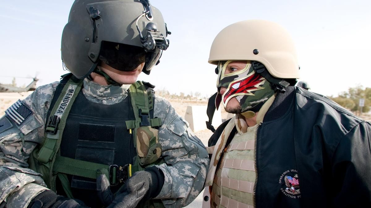 Rey Mysterio talking to a soldier in Iraq