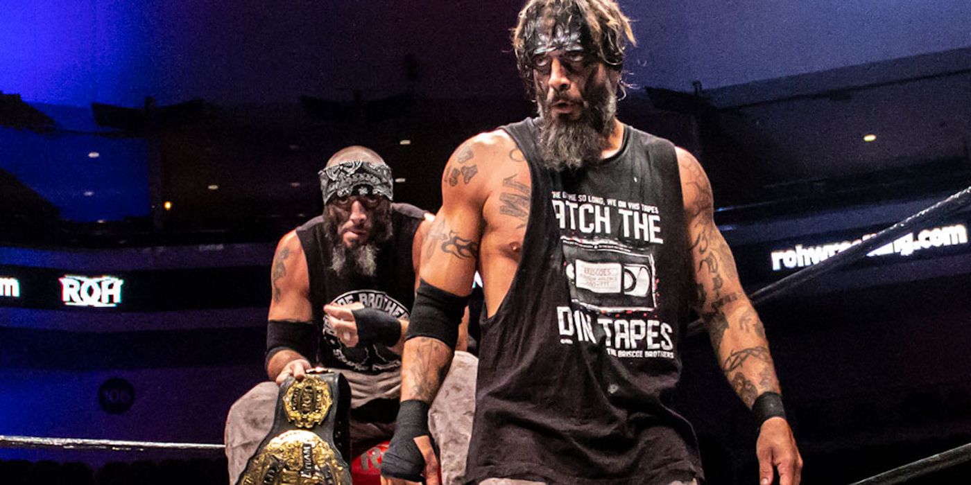 The Briscoe Brothers with the ROH tag team titles.