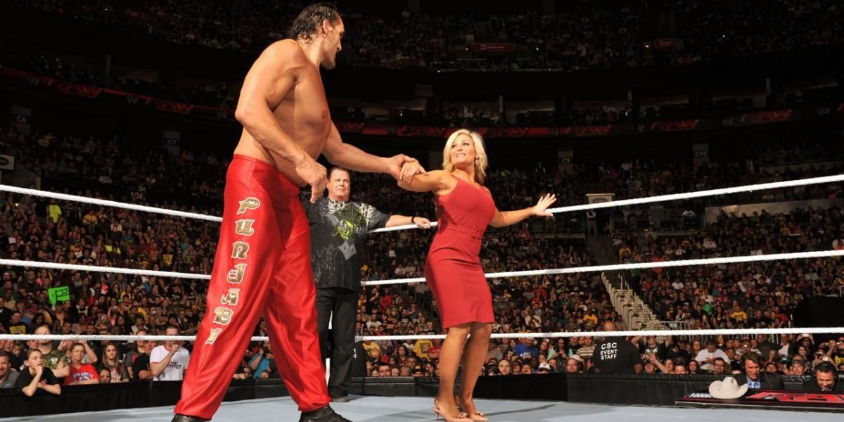The Great Khali and Natalya dancing in the ring 