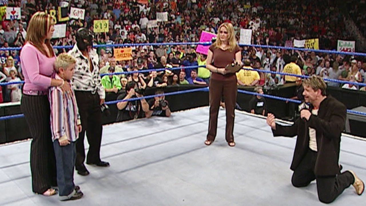 Rey Mysterio, Eddie Guerro and Dominik Mysterio in the ring