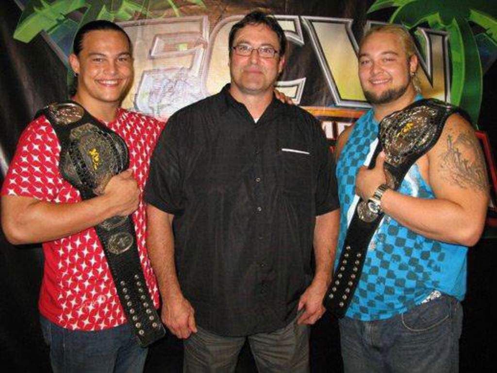 Rotunda Family: Bo Dallas, Mike Rotunda (IRS), and Bray Wyatt