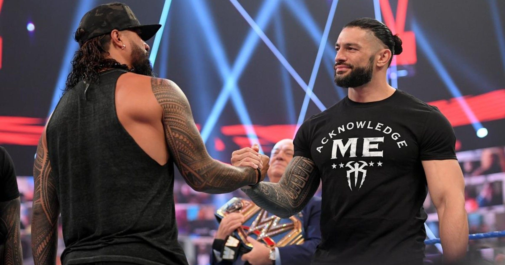 uso shaking hands with reigns