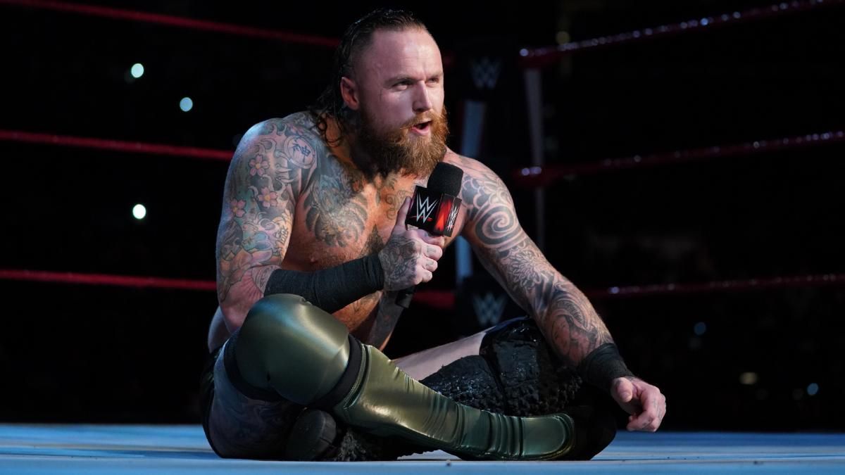 ALEISTER BLACK CUTTING A PROMO IN THE RING