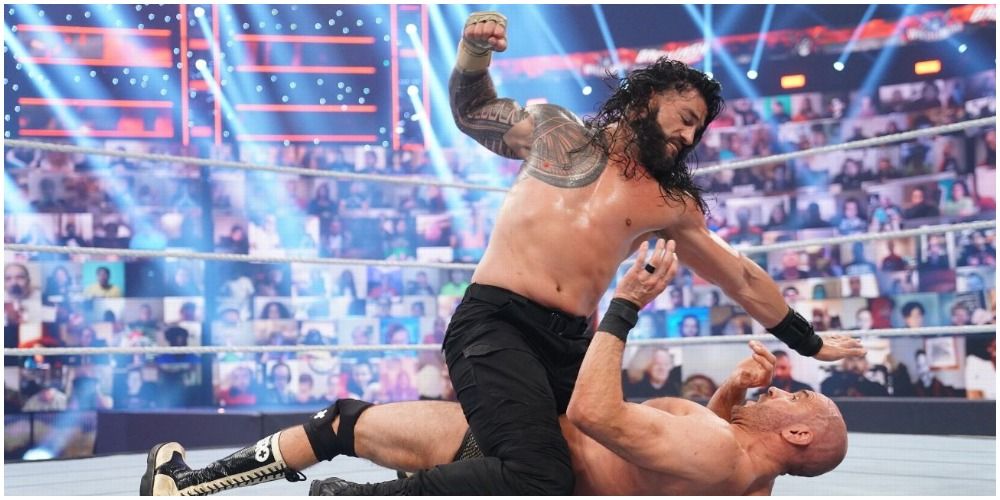 Roman Reigns attacking Cesaro WrestleMania Backlash