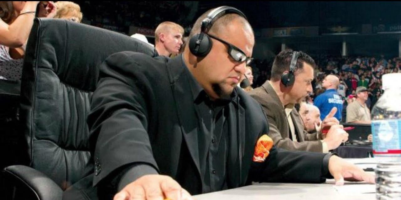 Tazz and Michael Cole