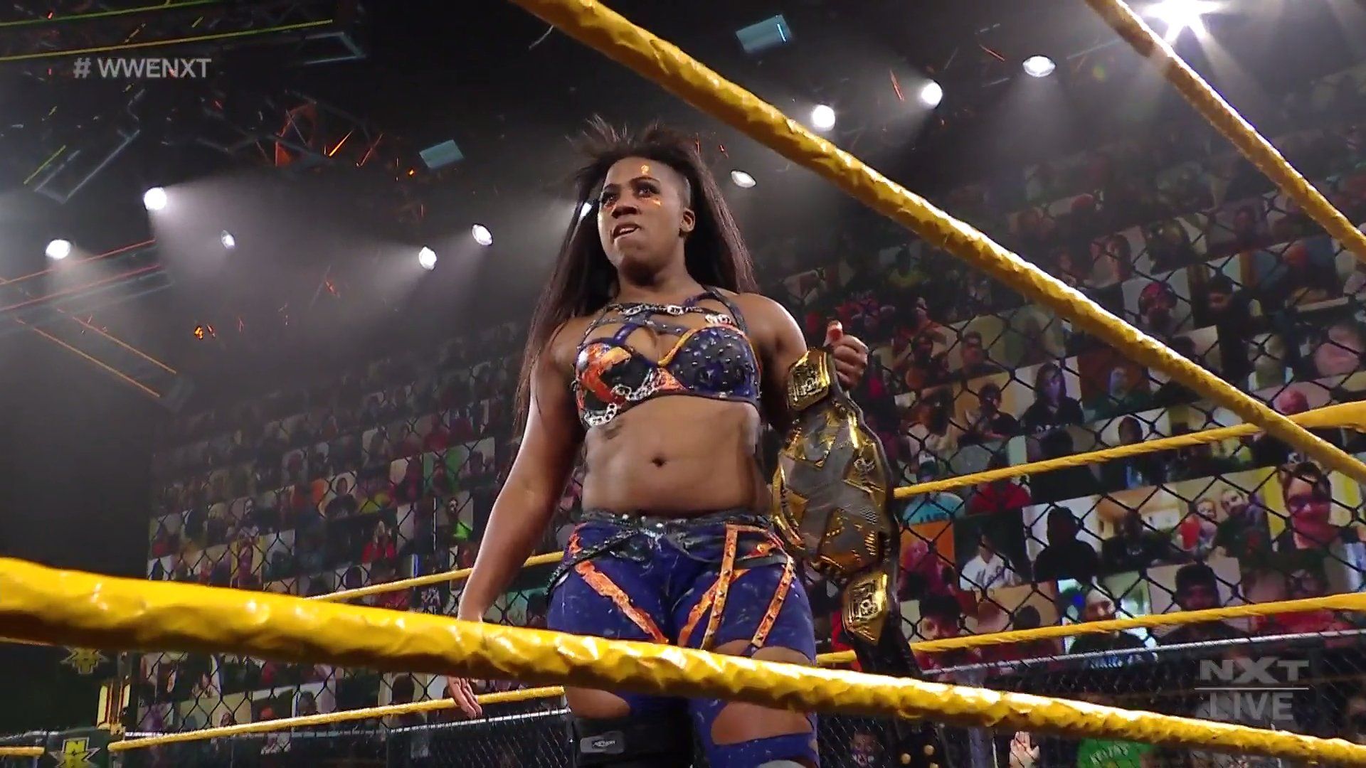 NXT Superstar Ember Moon with the NXT Women's Championship on NXT 6/8/2021