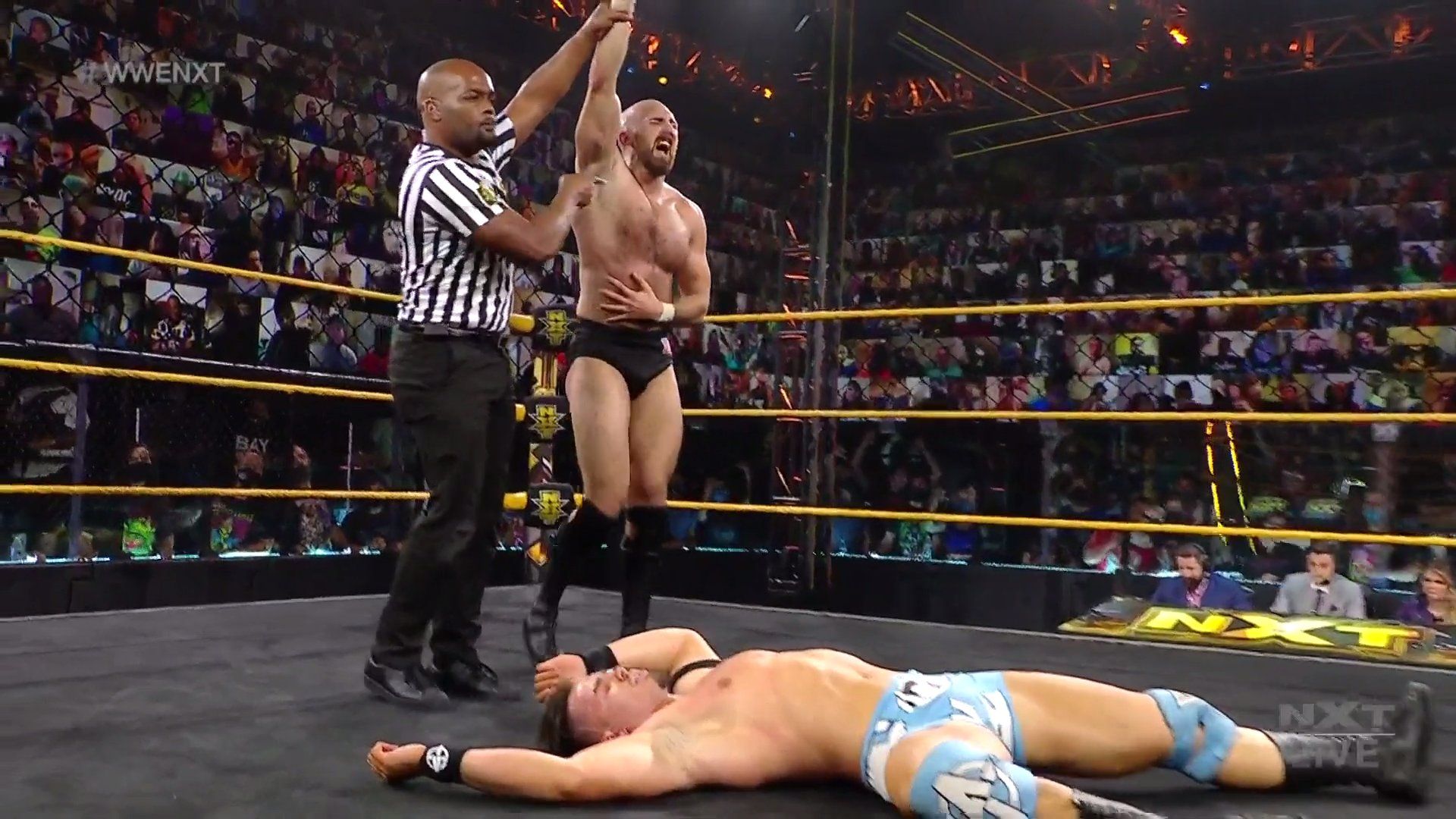 NXT Superstars Oney Lorcan and Austin Theory after their match on NXT 6/8/2021