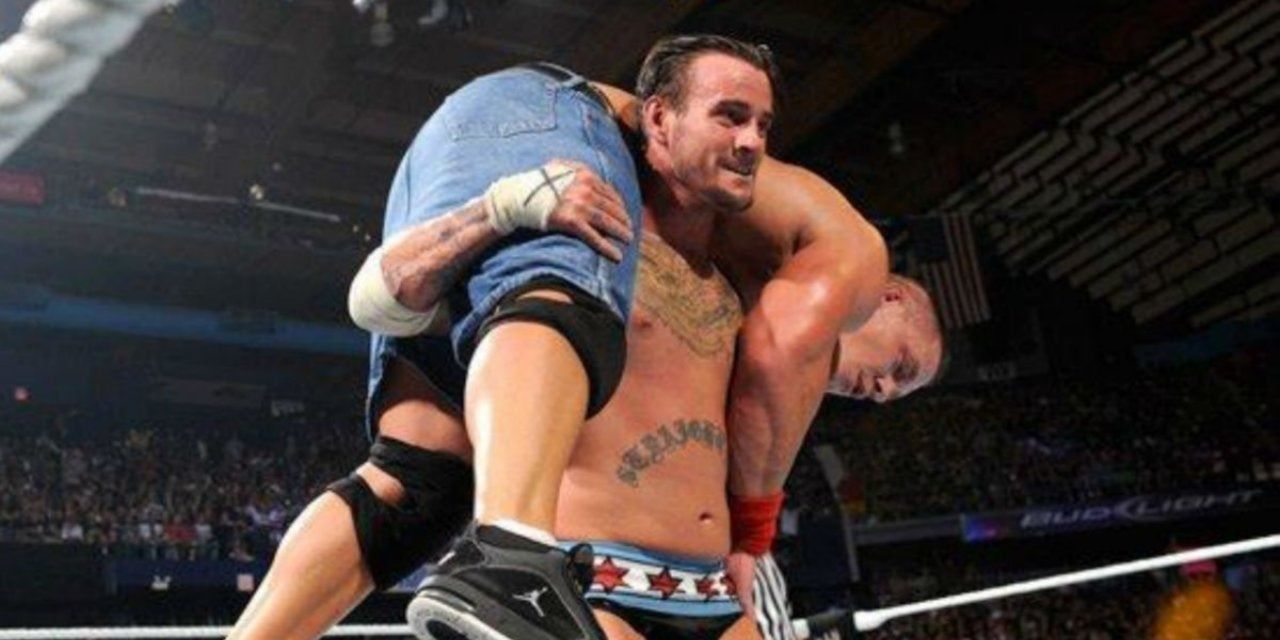 CM Punk hits John Cena with the GTS