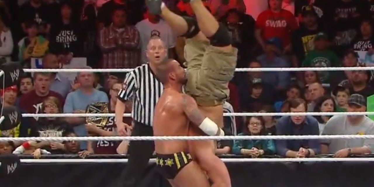 CM Punk hits John Cena with a piledriver