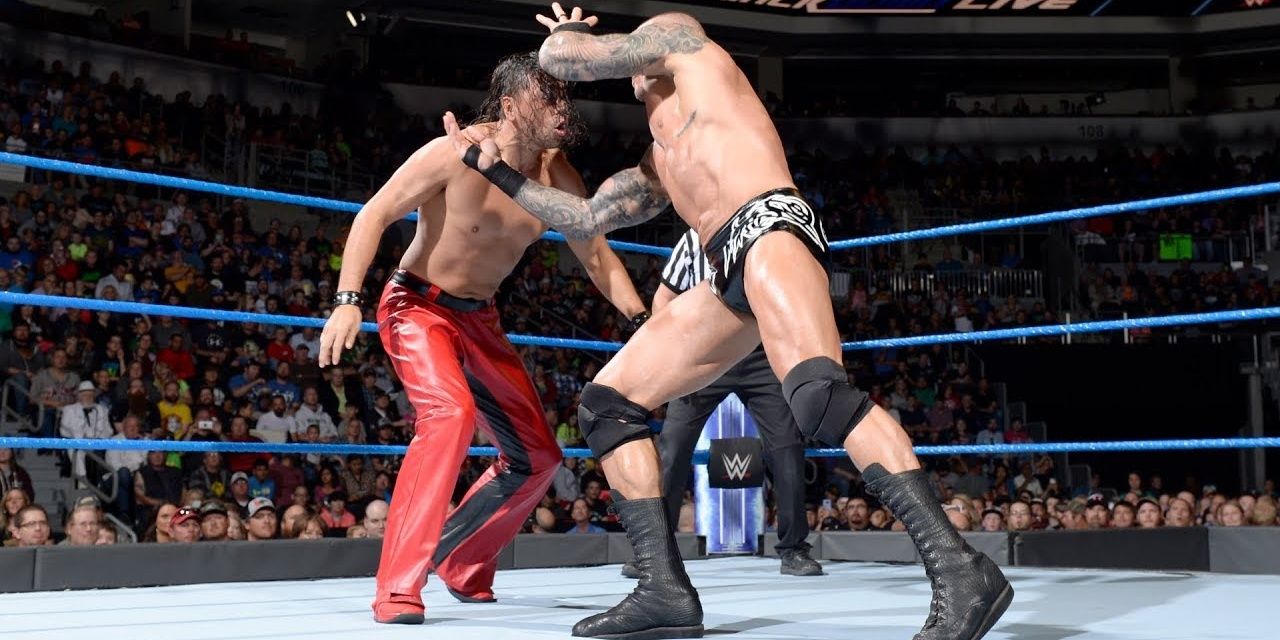 Randy Orton going for the RKO on Shinsuke Nakamura
