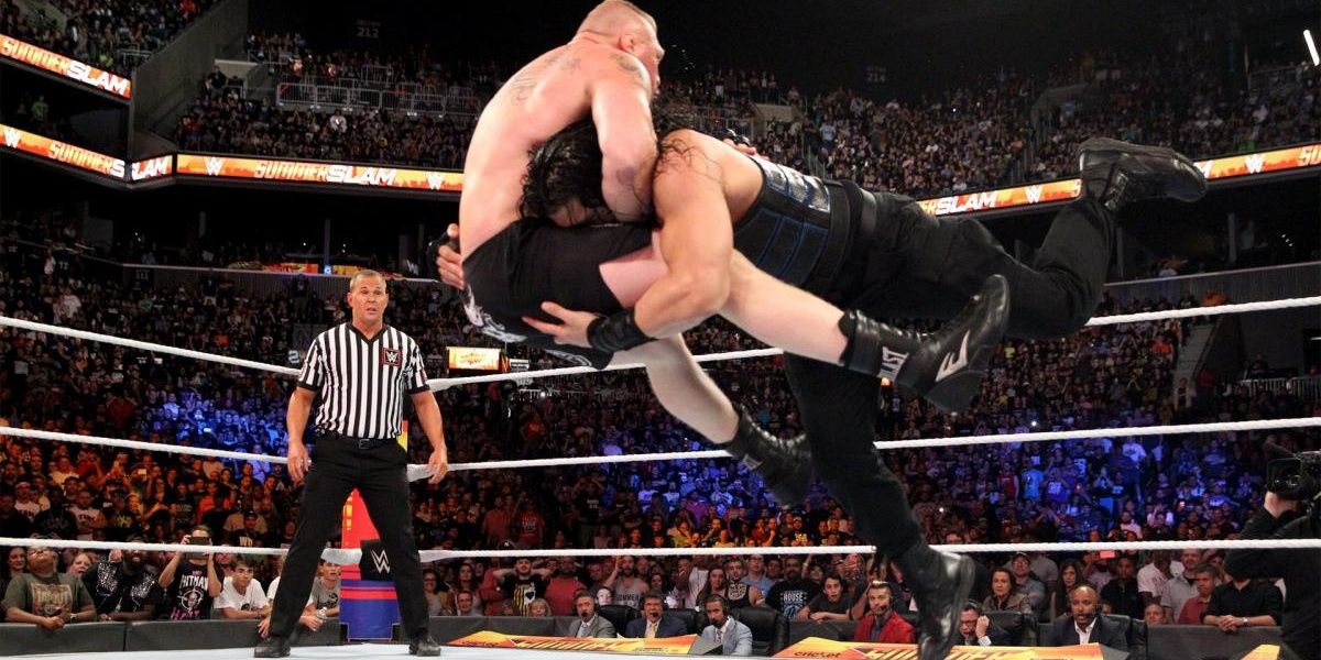 Roman Reigns Spearing Brock Lesnar 