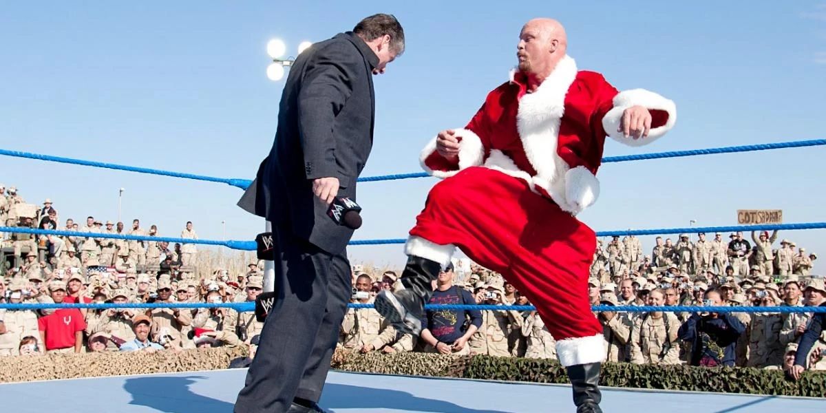 Steve Austin stuns Vince McMahon as Santa Claus