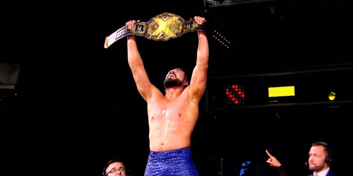 andrade holding the nxt championship