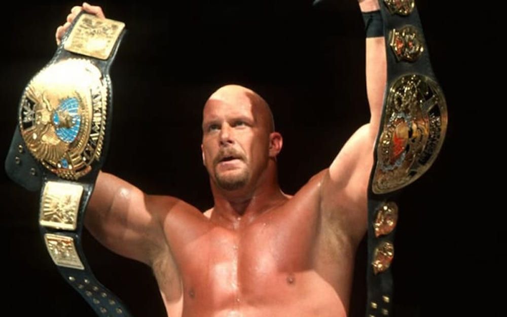 Steve Austin with two WWE Championship belts