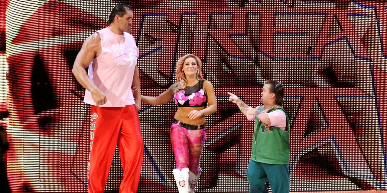 The Great Khali and Natalya with Hornswoggle