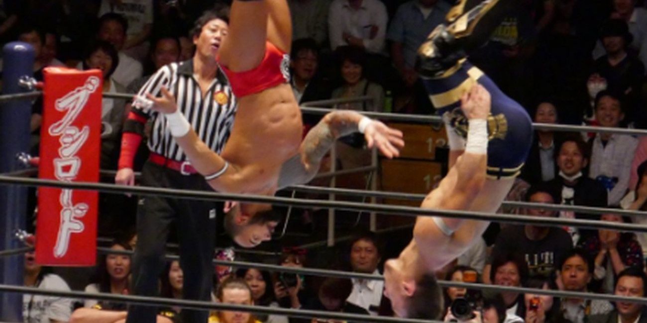 Will Ospreay and Ricochet flipping in mid-air 