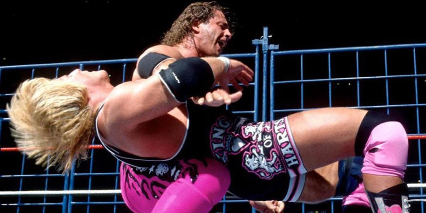 Bret Hart vs Owen Hart in a WWE steel cage match.