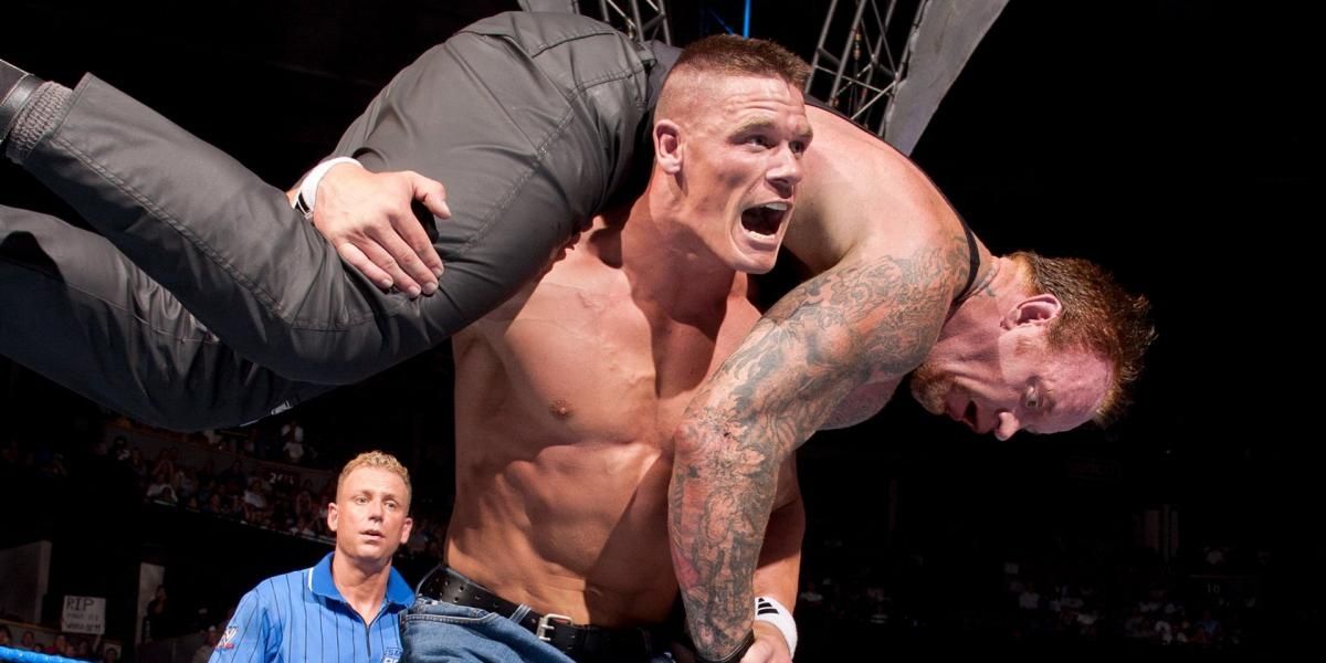 Cena proceeds to nail Undertaker with the Attitude Adjustment
