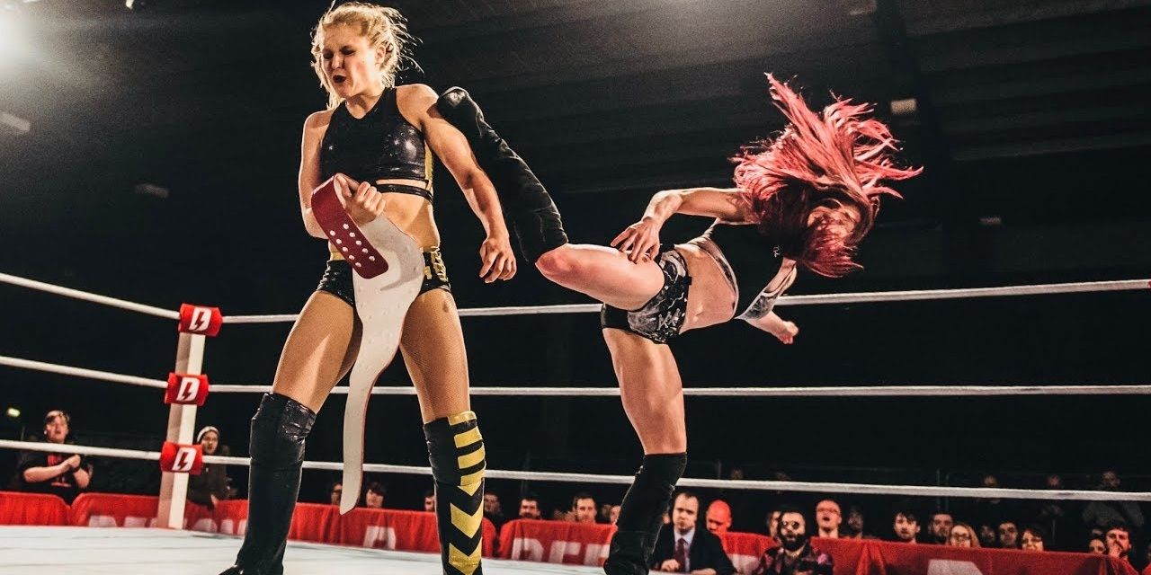 Kay Lee Ray hits a kick to the face Cropped