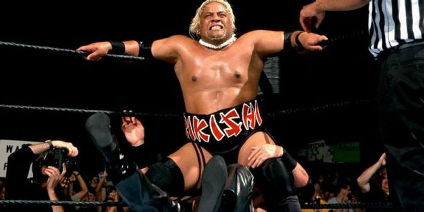 Rikishi hits the stink face in WWE.