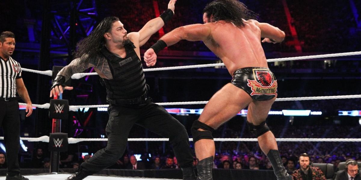 Roman Reigns fighting Drew McIntyre Cropped