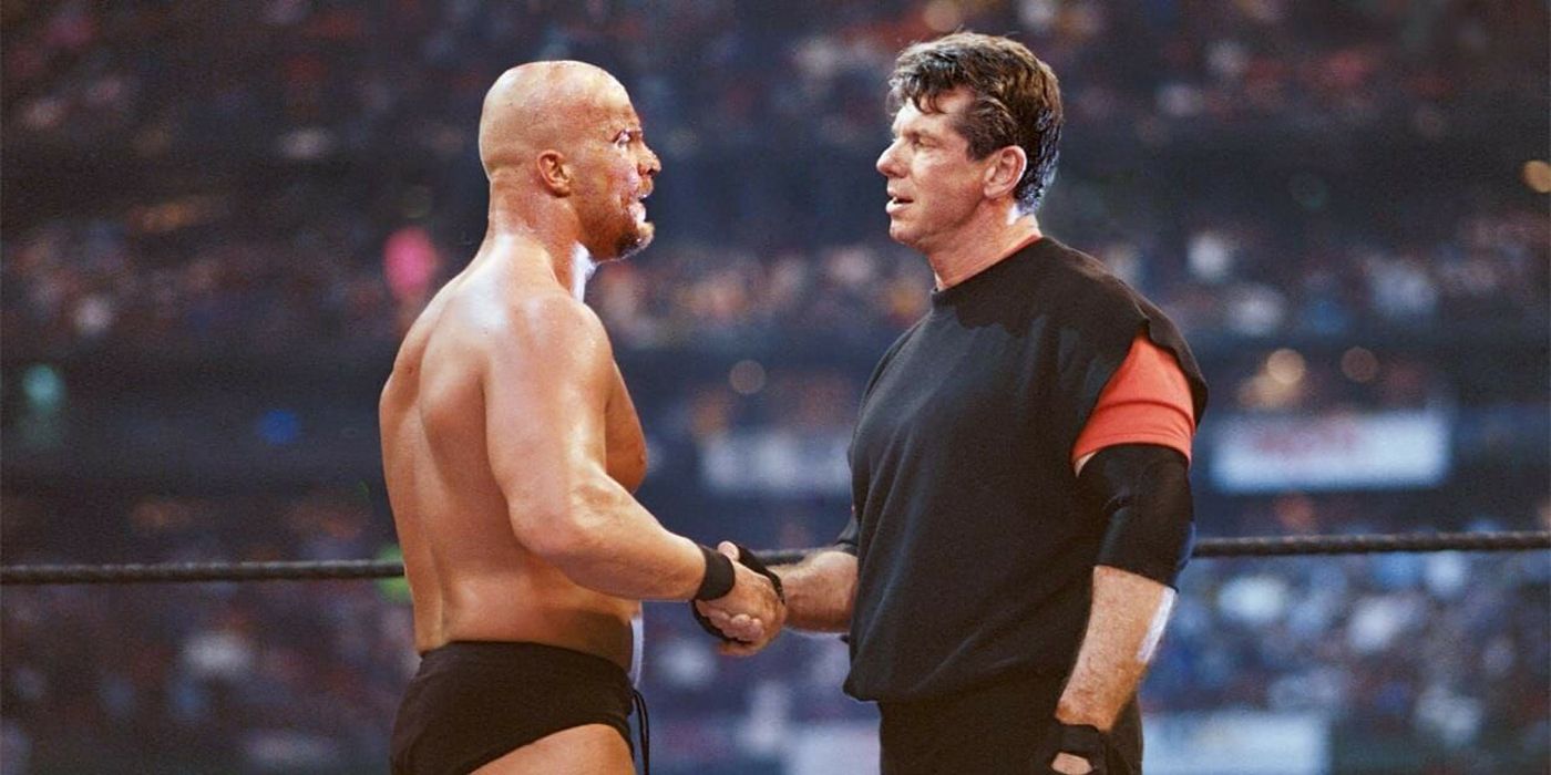 Steve Austin shakes Vince McMahon's hand at WrestleMania 17.