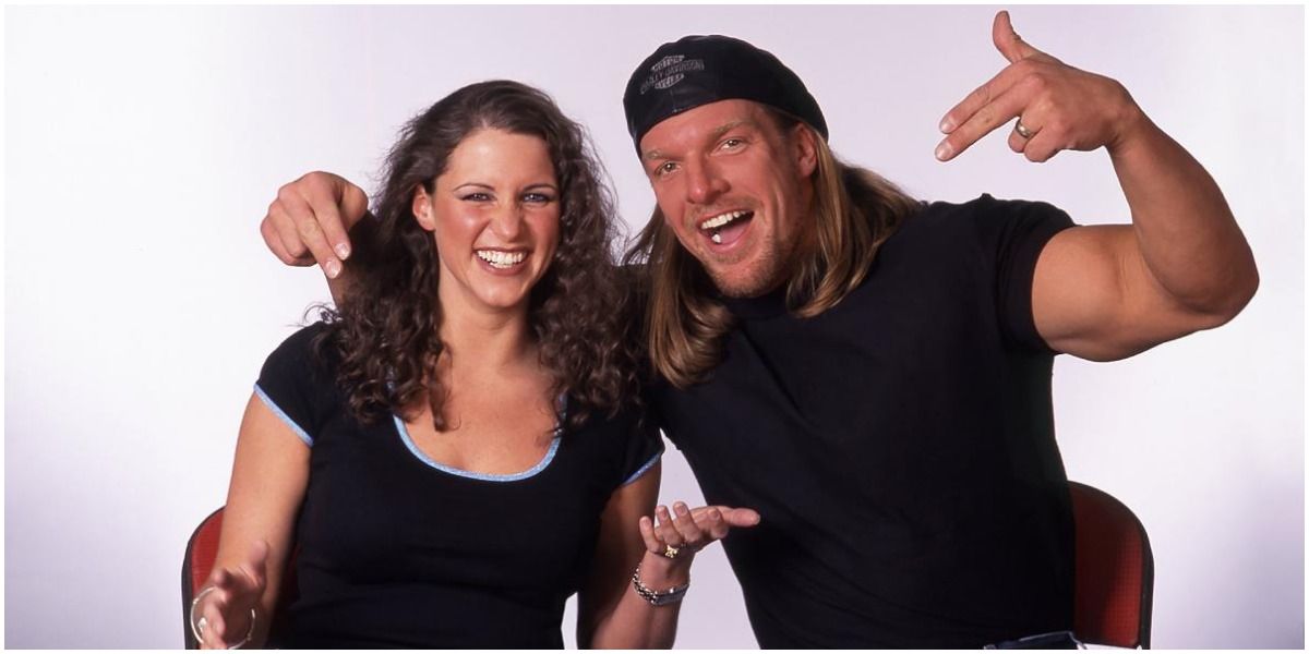 Triple H pointing to Stephanie McMahon during interview
