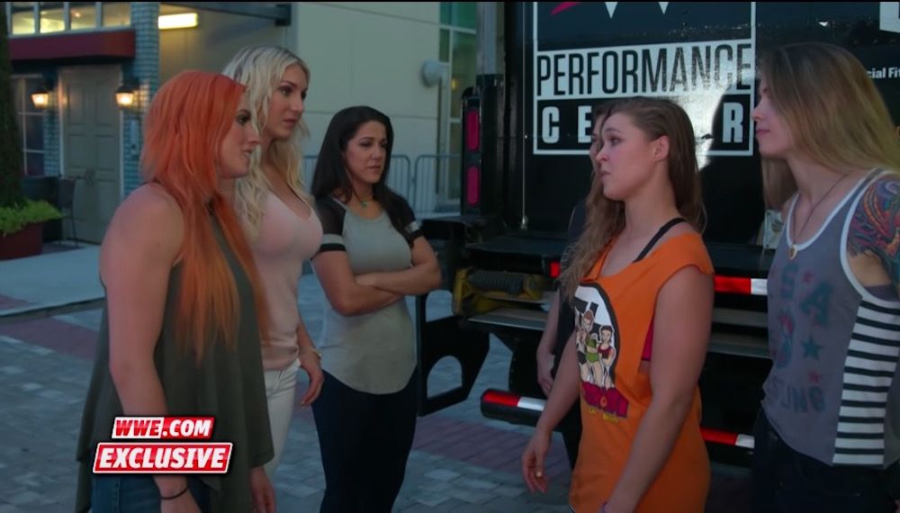 The Four Horsewomen of NXT stare down with the Four Horsewomen of MMA