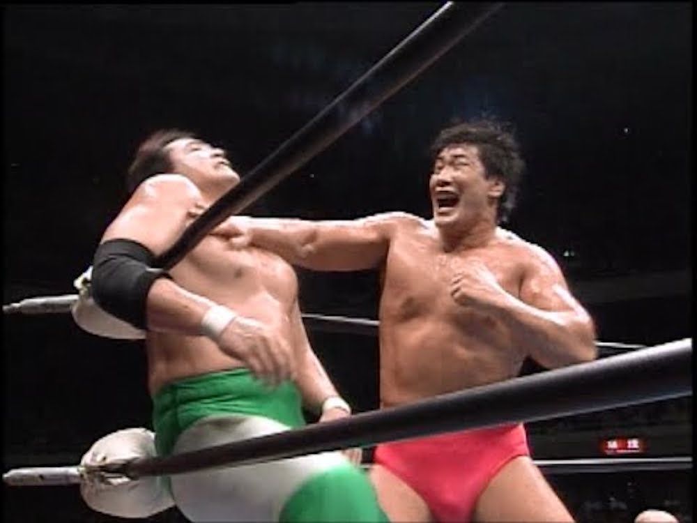 All Japan Pro Wrestling: Kenta Kobashi delivers chops to the chest of Mitsuharu Misawa