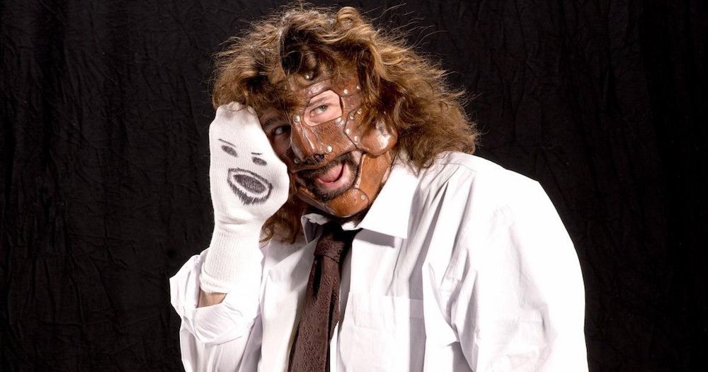 Mankind (Mick Foley) with Mr. Socko