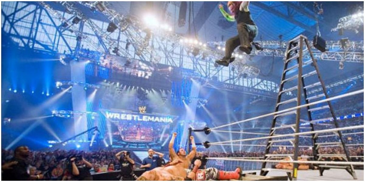 Jeff Hardy leap onto Edge from top of ladder through ladder