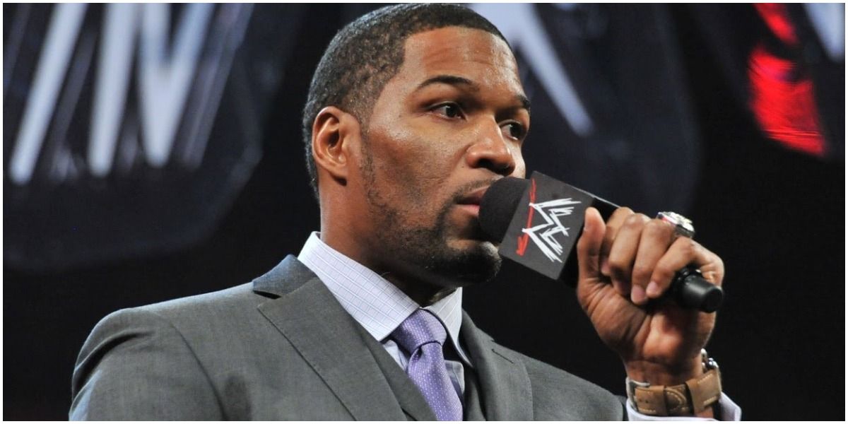 Michael Strahan in ring with mic