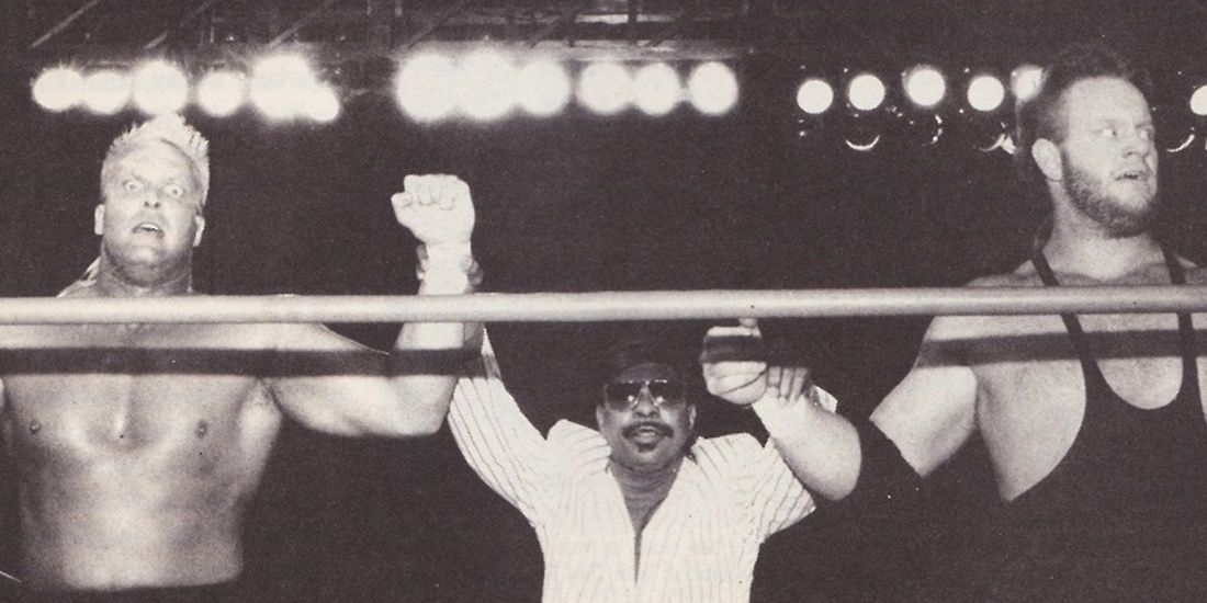 Teddy Long managing The Undertaker Cropped