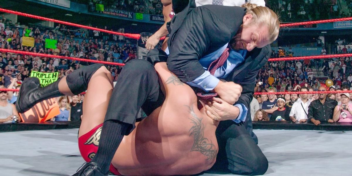 Triple H Attacks Randy Orton