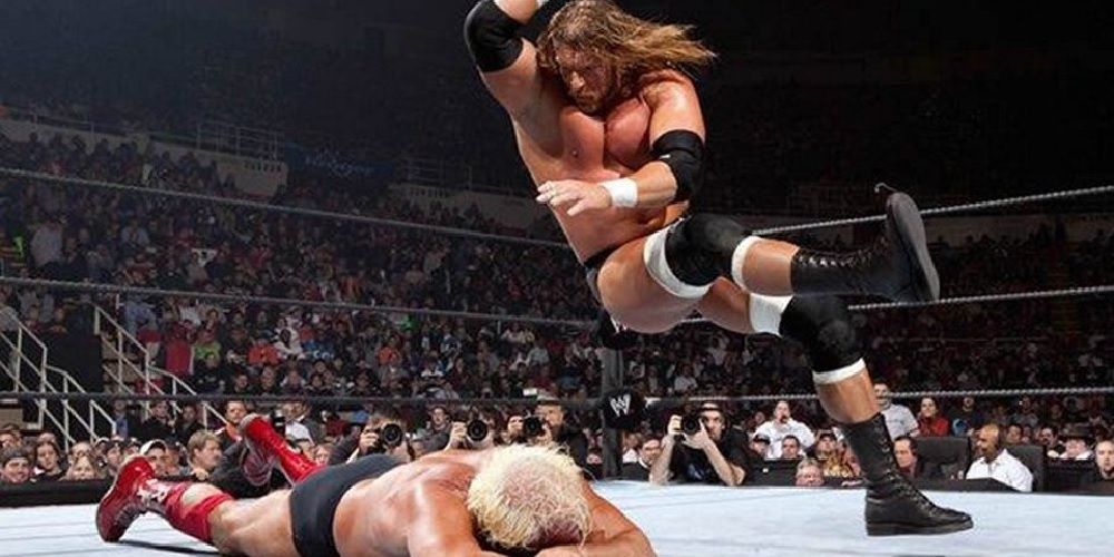 Triple H attacks Ric Flair