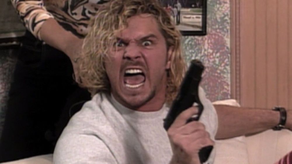 Brian Pillman takes out a gun on Monday Night Raw