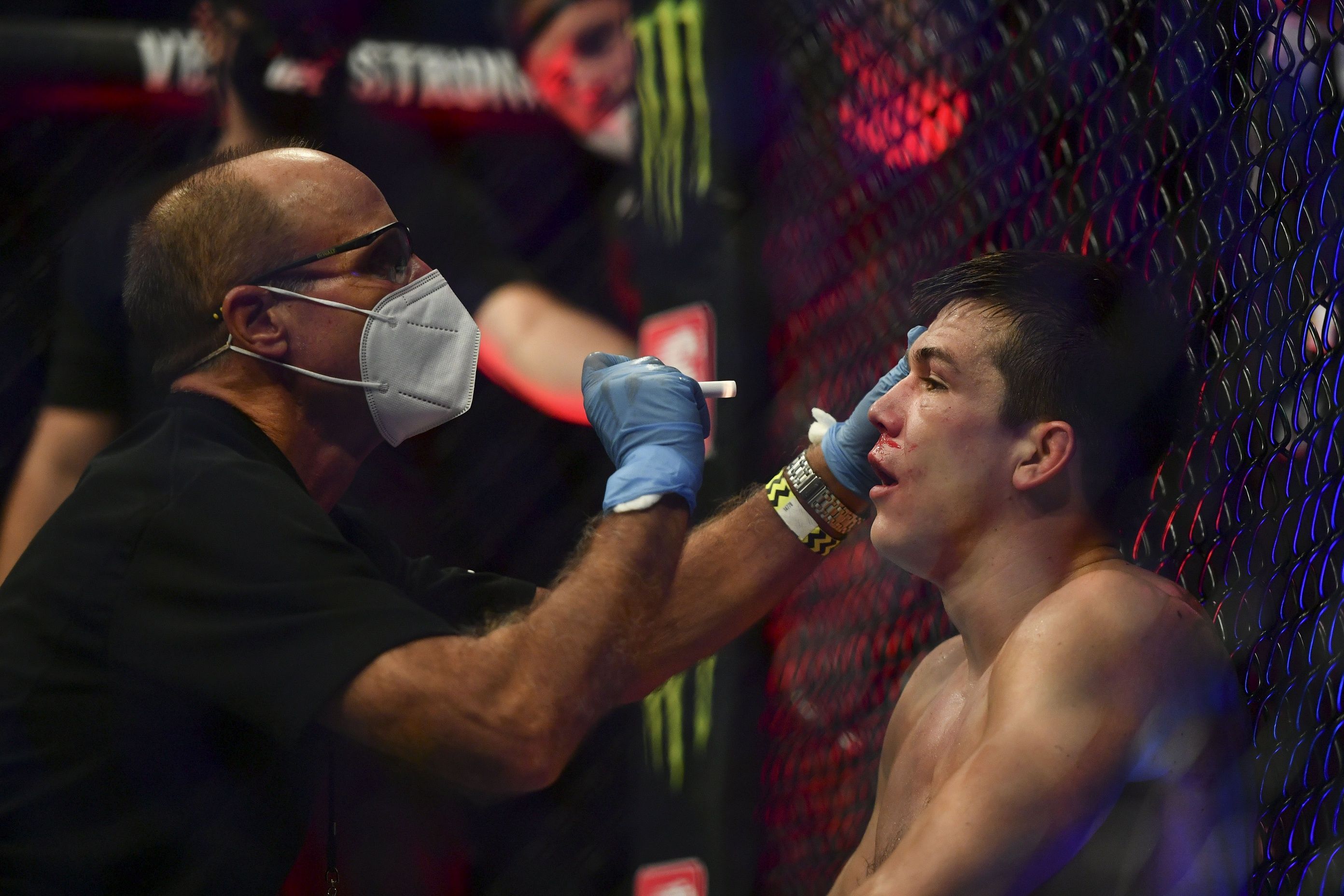 Alexander Hernandez getting checked by doctor during UFC fight