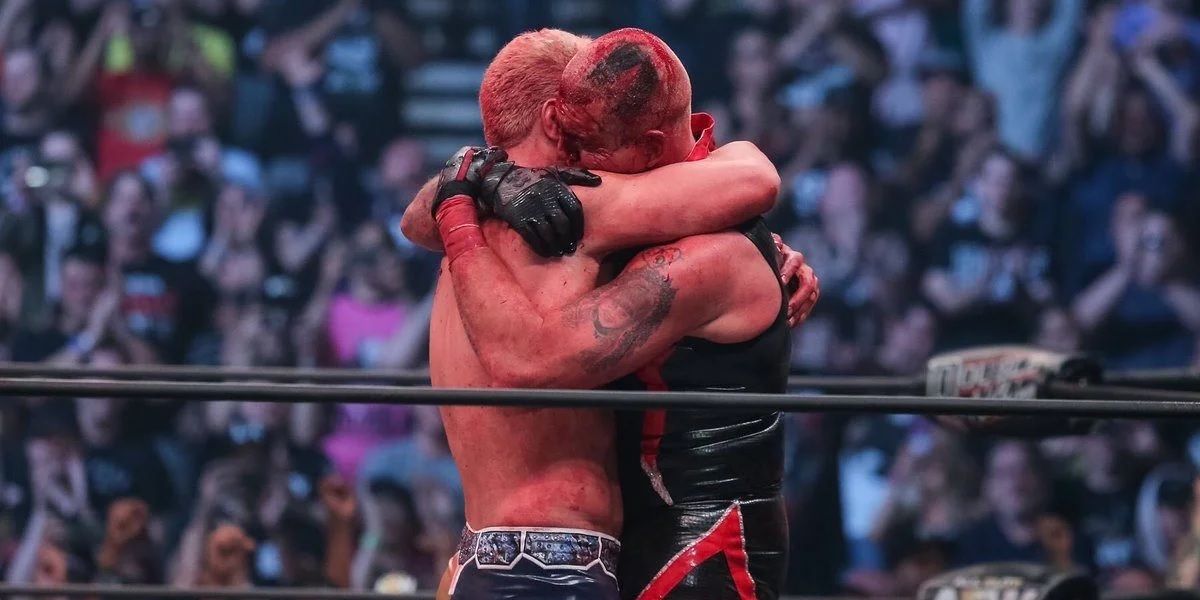 Cody and Dustin Rhodes hug AEW
